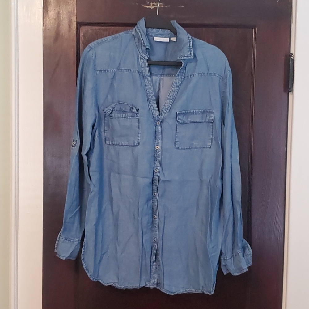 Denim color top with rounded tunic style hem